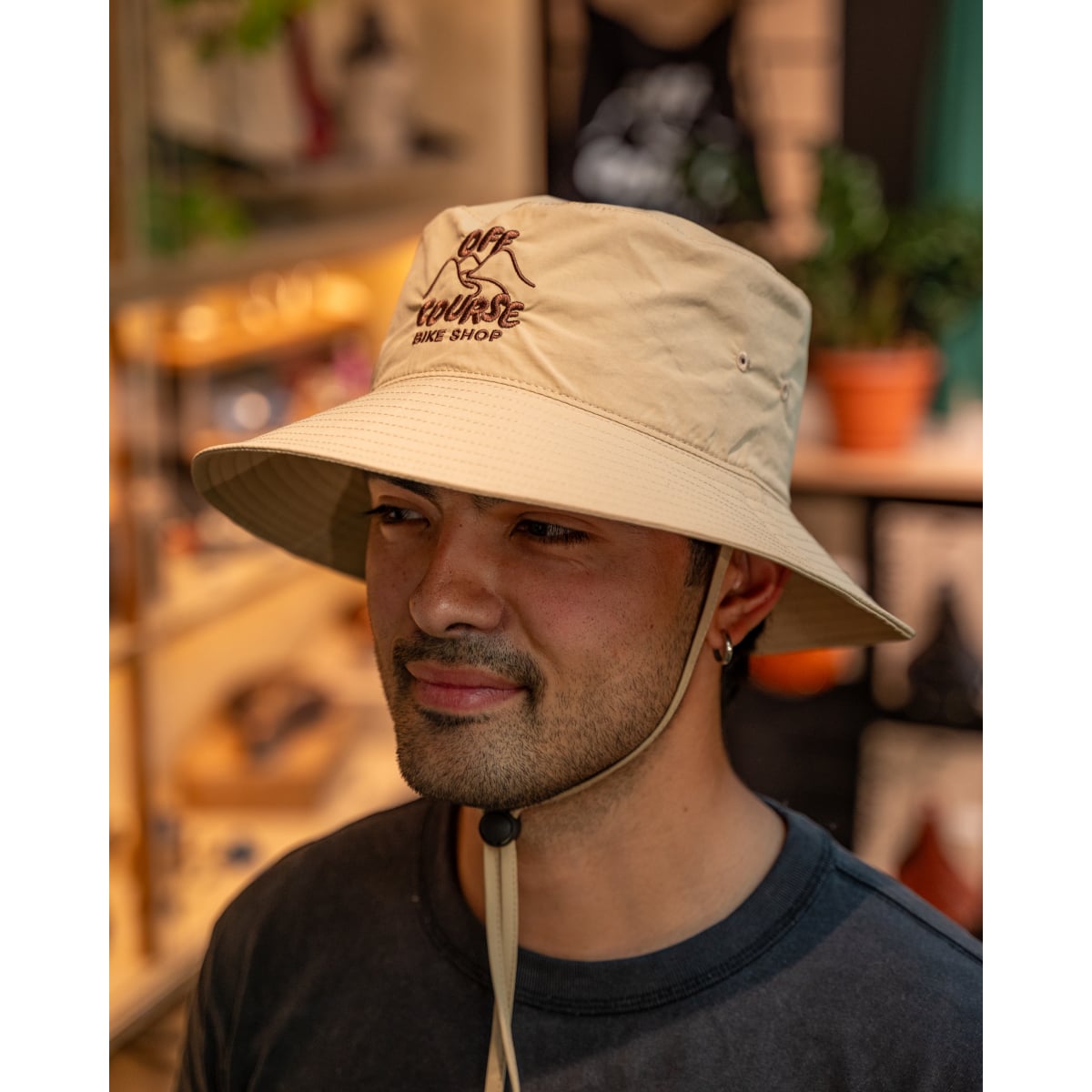 Image of Off Course Bike Shop Wide Brim Nylon Bucket Hat - Embroided Khaki