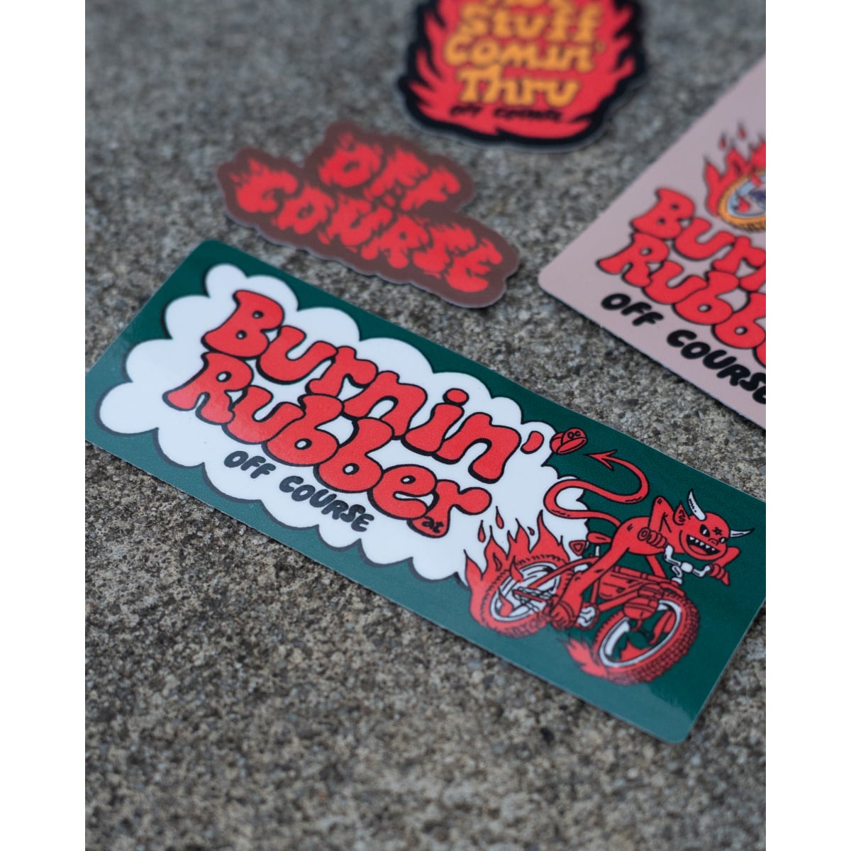 flitnvw98yxgdkjxa4q5.jpg Image of Burnin' Rubber Off Course Sticker - Landscape 100mm