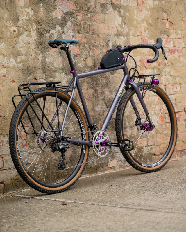 Ben’s @wilde.bikes Rambler SL is one special build, with a super fun mix of flair and function💜

A Sport Tourer to cover everything from commutes to long days in the saddle and beyond!✨

Wilde Rambler SL Frameset, Disco Moondust, Large
White Industries Headset
Ritchey Comp 4-Axis Stem
Ritchey Butano Comp Handlebar
Ergon Bartape, BT Road, 2mm
Wolf Tooth Bar Ends
Ritchey Comp 2-Bolt Seatpost
Wolf Tooth Seat Collar
White Industries G30 Crankset
White Industries VBC V2 48/32t Chainring Set
White Industries Bottom Bracket
Shimano XT T8000 Pedals
Shimano GRX RX-820 2x12 Speed Shifting & Braking
Schmidt SON 28 Dynamo Front Hub, Limited Purple Edition.
White Industries CLD Rear Hub
DT Swiss Competition Spokes
DT Swiss GR531 Rims
Rene Herse 700x44mm Corkscrew Climb Endurance Tyres
Sim Works Bento Front Rack
Schmidt SON Edelux II Front Dynamo Light
Tubus Logo Classic Rear Rack
Schmidt SON Rack Mount Rear Dynamo Light
Wizard Works Go-Go Top Tube Bag, Medium
Sinewave Revolution USB Charger
Forager Cycles Cable Cherries, Purple
Blue Lug Tubeless Valve Caps
Knog Oi Bell, Limited Edition

Thanks, Ben!
Happy Trails✌️

@wilde.bikes 
@whiteind 
@ritcheylogic 
@ergonbike 
@wolf_tooth_comp 
@shimanoaustralia 
@sonnabendynamo 
@dtswiss_distributor_aus 
@reneherse 
@simworks 
@hebie_tubus_racktime 
@wizard.works 
@foragercycles 
@bluelug 
@knog 
@bikejerks 

#wilderamblersl  #wildebikes #offcoursecustoms
